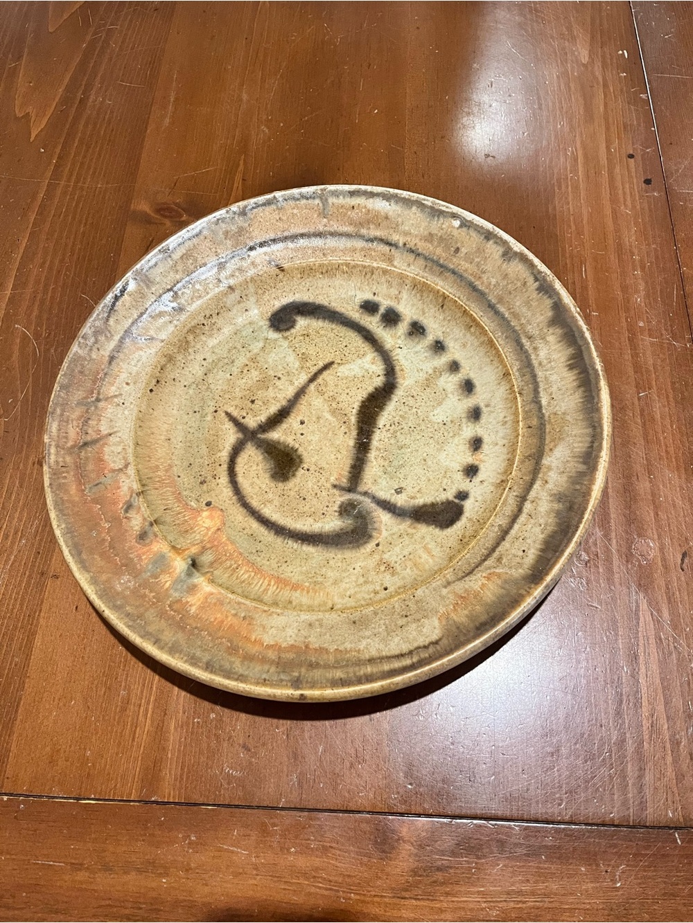 Handcrafted Tan Ceramic Plate Dish with Abstract Black Brushstroke